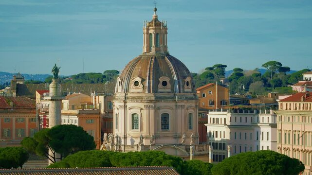 View on Trajan's Column and the church of the holy of Mary at the trajan forum. Rome, Italy