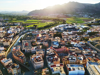 Aerial shot, drone point of view of ancient spanish city of Orihuela with building and mountains...