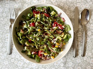 Purslane salad with cheese balls and olives inside. Healthy diet salad.