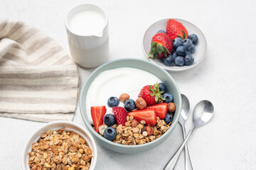 Greek yogurt bowl with crunchy granola and berries