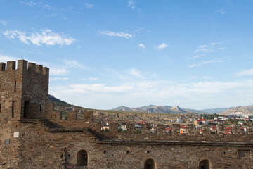 a landscape depicting an ancient wall made of stone