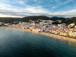 Obraz premium Aerial view of Sesimbra, Portugal's coastline