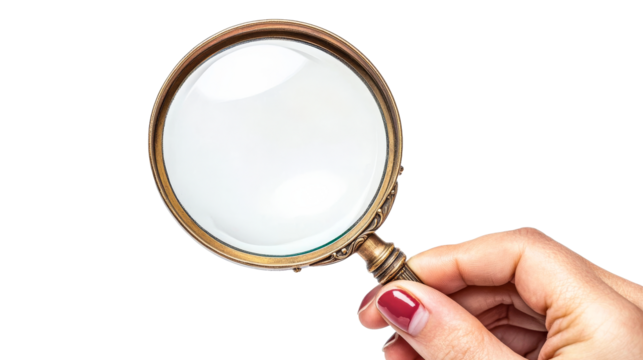 Hand holds ornate magnifying glass for inspection, cut out transparent