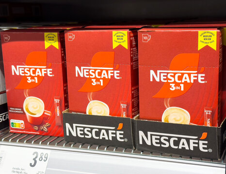 Nescafe 3in1 instant coffee packets on store shelf display