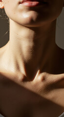 Ethereal Neck: Sun-Kissed Skin, Delicate Light & Shadow, Close-Up Portrait of Female Beauty, Details, Elegance, Healthy Glow.