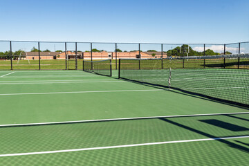 Fototapeta premium Hardcourt Tennis Facility on a Sunny Day