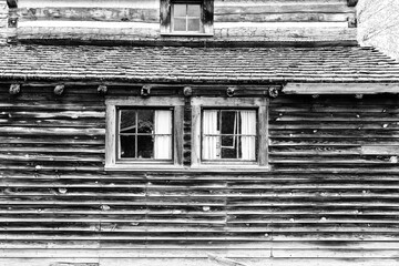Old weathered wood barn wall, door and window