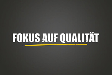 Fototapeta premium Fokus auf Qualitaet (Focus on quality) - A blackboard with white text.