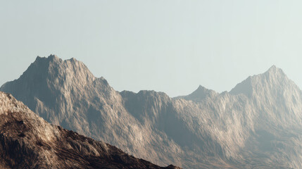 Fototapeta premium Majestic mountain peaks rise against a soft, clear sky, showcasing the rugged beauty and grandeur of a natural landscape in a serene, outdoor setting.
