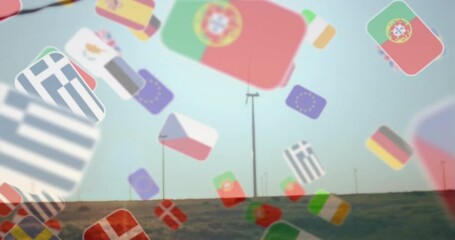 Slender wind turbines spinning on grassland field, translucent flag icons drifting across sky - Powered by Adobe