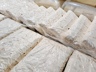 raw tempeh. Tempeh or tempeh is a typical Indonesian food made from fermented soybeans in addition to yeast or 