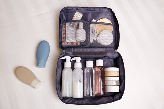 Compact cosmetic bag with various travel personal care products