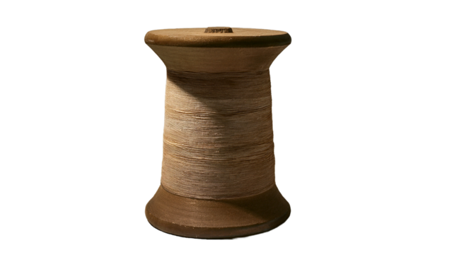 High resolution image of a vintage wooden spool of thread perfect for textile craft and vintage themed projects Ideal for websites blogs and social media