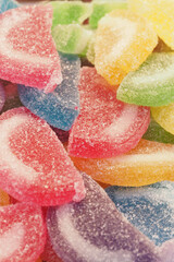 Colorful gummy candies piled together in a vibrant display