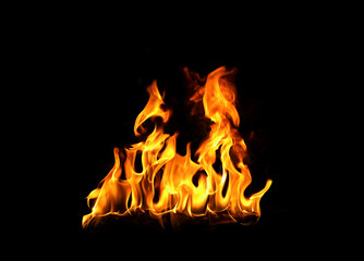 Fototapeta premium Isolated abstract flames collection on black background. Flames on black background. Concept of burning effect texture. Graphic design. Bonfire. Flames at night. Flame effect with burning fire. 