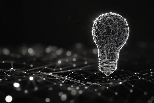 conceptual wireframe light bulb glowing in darkness, innovation metaphor, 3d render