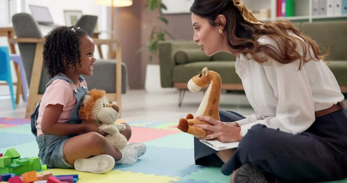 Kindergarten, talking and toys with teacher and girl playing games for development, learning and story. Classroom, wellness therapy and therapist with kid, child student and woman with stuffed animal