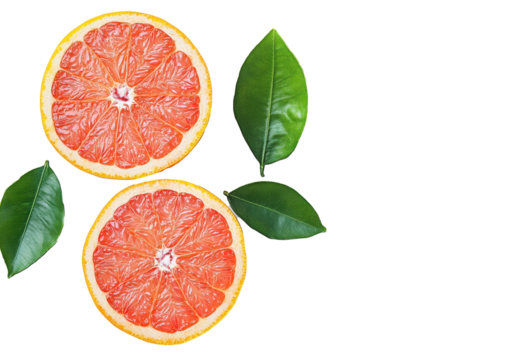 Freshly cut grapefruit displayed with green leaves on a light background showcasing its vibrant color and texture