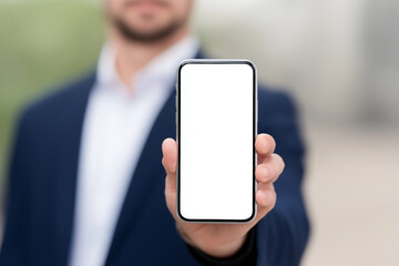 Professional Man Holding White Smartphone &ndash; App Mockup and Digital Communication Concept