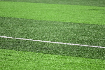 Obraz premium artificial green grass background for playground