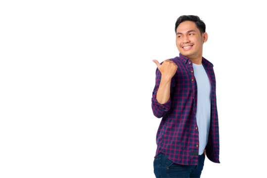 Cheerful young Asian man in plaid shirt pointing thumbs at copy space, advertisement banner isolated on transparent background - Powered by Adobe