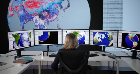 Female Scientist Using Computer