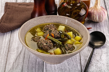 Soup with beef meatballs and vegetables