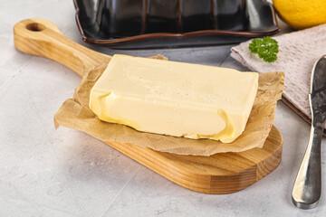 Dairy butter piece over board