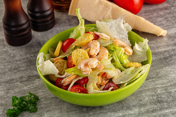 Tasty caesar salad with prawn