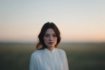 portrait in rural setting subject facing camera blurred background