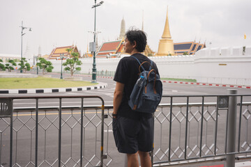 solo travel with man chilling see city life in bangkok thailand in summer season