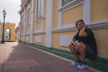 solo travel with man chilling see city life in bangkok thailand in summer season