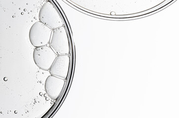 Cosmetic moisturizing gel or skin serum in a petri dish. Copy space