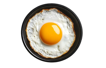 Top view of one sunny side up egg in small black pan isolated on white or transparent background