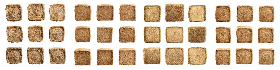 Stacked square bales of dried hay or straw in a rural agricultural setting.