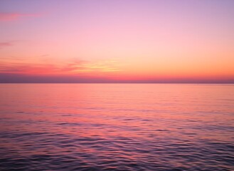 Fototapeta premium Serene Sunset Over Calm Waters,