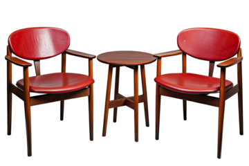 Two red upholstered chairs and a small table