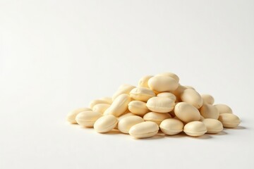 Pile of white beans against pure white backdrop, bright, simple, isolated