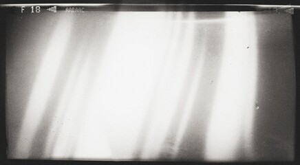 Old film texture with scratches, noise and glitch shapes. Realistic overlay film texture in black-white, dust and grain. Distressed retro movie or photo negative effect of cinema nostalgia. Artwork