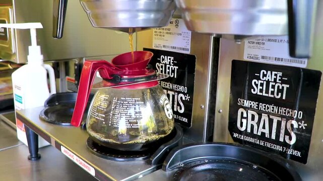 Preparing 7 Eleven take away coffee to go cup Mexico.
