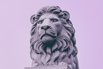 Close-up of a stone lion statue head against a pastel backdrop.