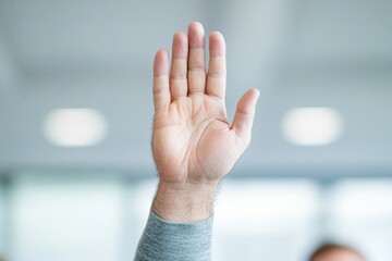 Raised hand signifies participation, engagement, and readiness f