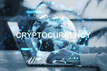 Person typing on laptop with digital cryptocurrency globe, blockchain and finance network data overlay in modern tech concept background..