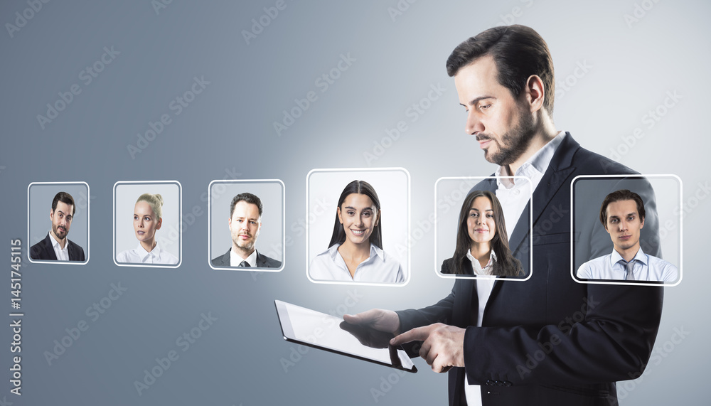 Poster businessman using tablet to select digital profiles of diverse workers on light background for onlin