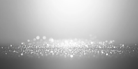 Silver glitter background with soft lighting