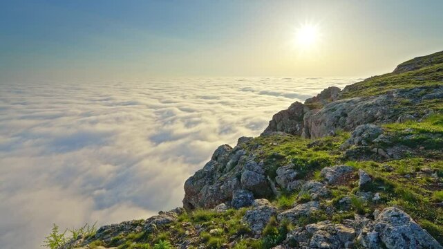 Mountain sunset over clouds. Misty nature landscape scene. Calm and zen nature scene. Color graded to Rec.709 from 10-bit Log source for maximum dynamic range. 