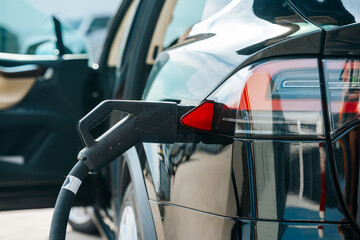 Electric vehicle charging station powered by green energy from renewable sources, promoting sustainability and reducing CO2 emissions