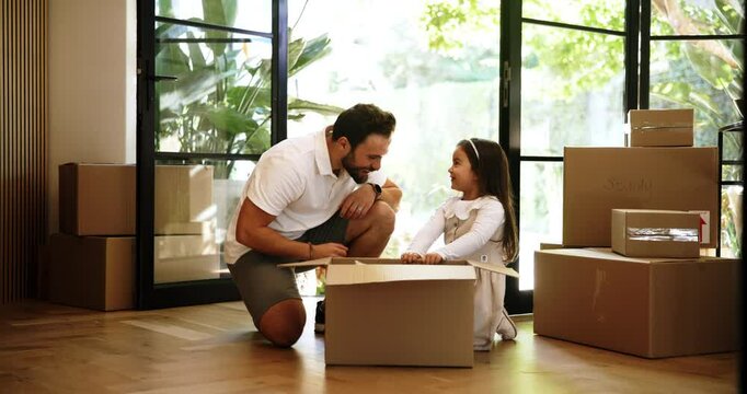 High five, box and child with father for moving out, property relocation and finish packing stuffed animal in home. Kid, girl and dad celebrate real estate goal, mortgage and smile for house loan