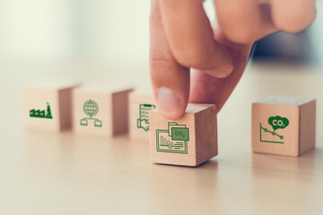 Carbon Data Open Protocol (CDOP) concept. Wooden blocks icons representing CO2 tracking, environmental data integration and transparent carbon management through open data protocols.