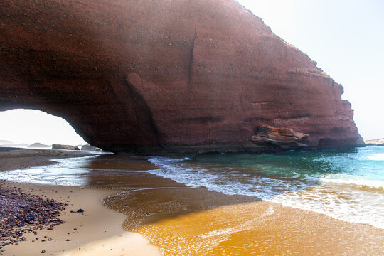 Natural red arch on atlantic ocean coast, Legzira beach. Red archs on atlantic ocean coast. Sidi Ifni, Morocco, Africa